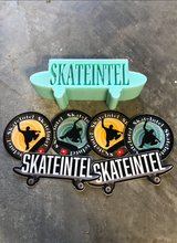 Load image into Gallery viewer, SkateIntel Wax and sticker pack that comes with every order!
